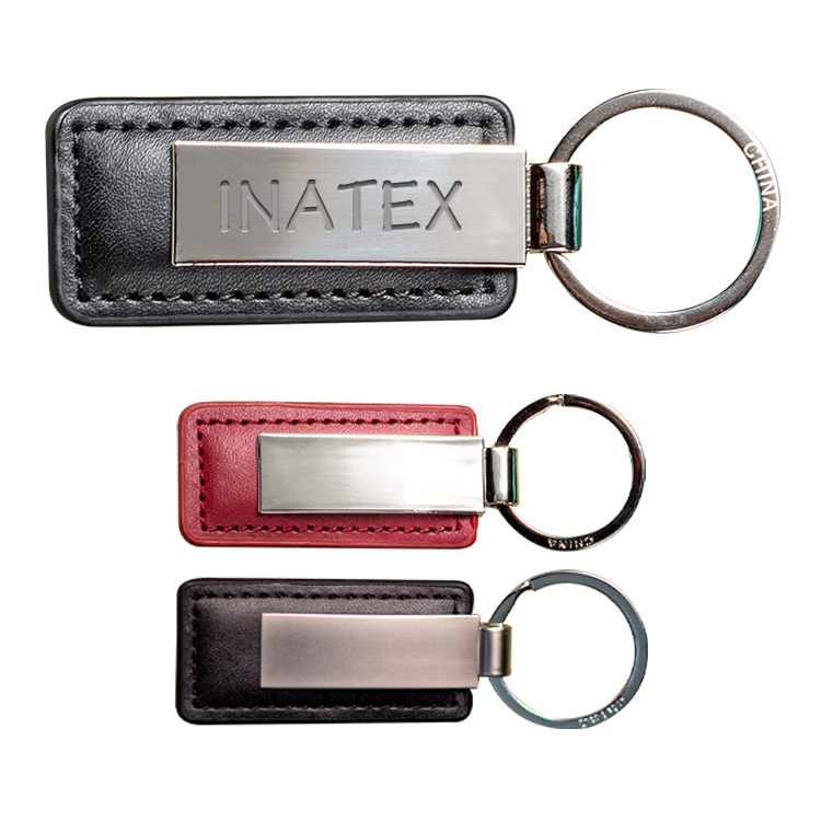 Engraved leatherette keychain with engraved logo.
