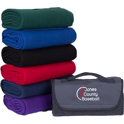 Embroidered gray fleece blanket that can fold within itself with attached handle.