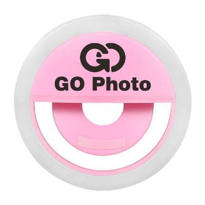 Pink plastic selflie light with a customizable logo.