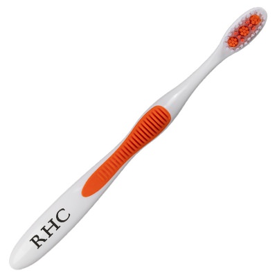 Orange plastic toothbrush with a custom imprint.
