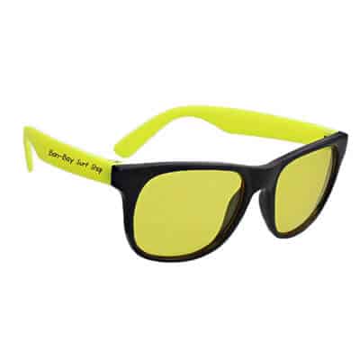 Polycarbonate yellow color tinted rubberized sunglasses with logo.