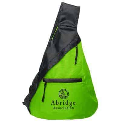 Polyester lime green downtown sling backpack with custom imprint.