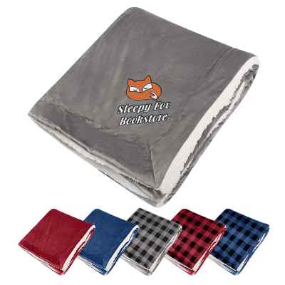 Solid gray sherpa throw blanket with custom design.