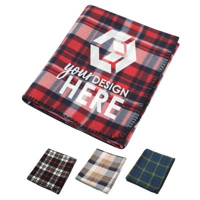 Red, black, and white plaid blanket with custom design.
