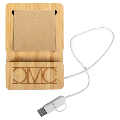 Bamboo phone holder with a personalized engraved logo.